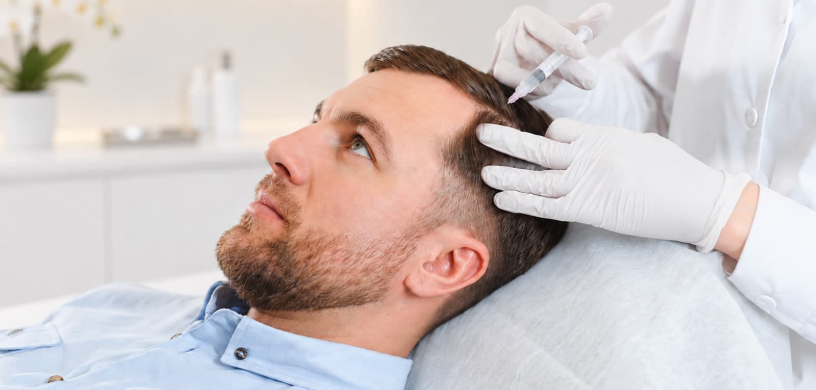 Male patient receiving Hair Loss Treatment at SKIN111 Clinic Dubai